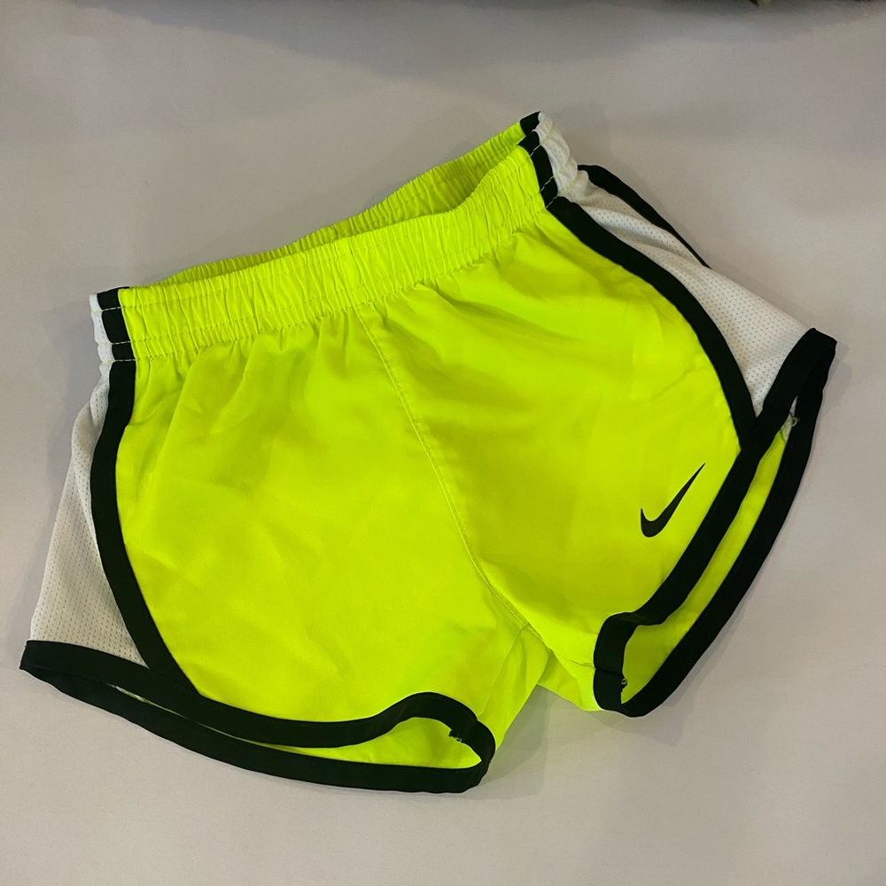Bright yellow and black Nike shorts